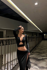 Chic Black Cut-Out Long-Sleeve Crop Top and High-Slit Maxi Skirt Set – Perfect for Elegant Evening Looks